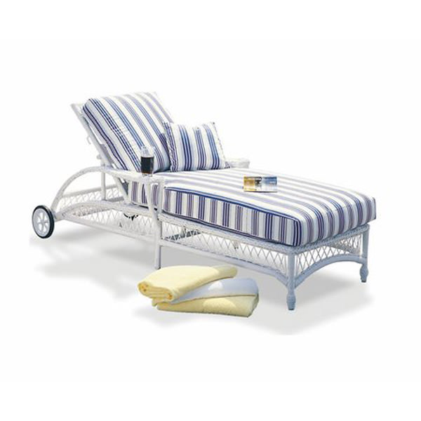 Striped blue and white outdoor lounge chair with cushions and sandals.